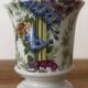 Adorable small porcelain vase from Paris with floral decoration.