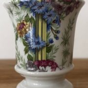 Adorable small porcelain vase from Paris with floral decoration.