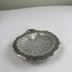 Shell-shaped catch-all tray