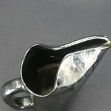 Old Biot, modernist pitcher in iridescent black ceramic.