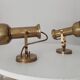Pair of vintage wall sconces CVL in solid gold brass.