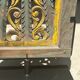 Rectangular Indonesian construction element with blue and yellow plant in carved wood
