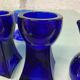 Set of 7 vintage cobalt blue glass footed candlesticks