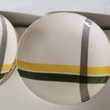Set of 9 soup plates with yellow and green patterns