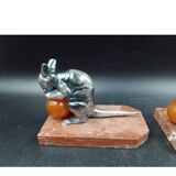 Antique Art Deco bookends in silver-plated metal, bakelite, and marble, signed H. M.