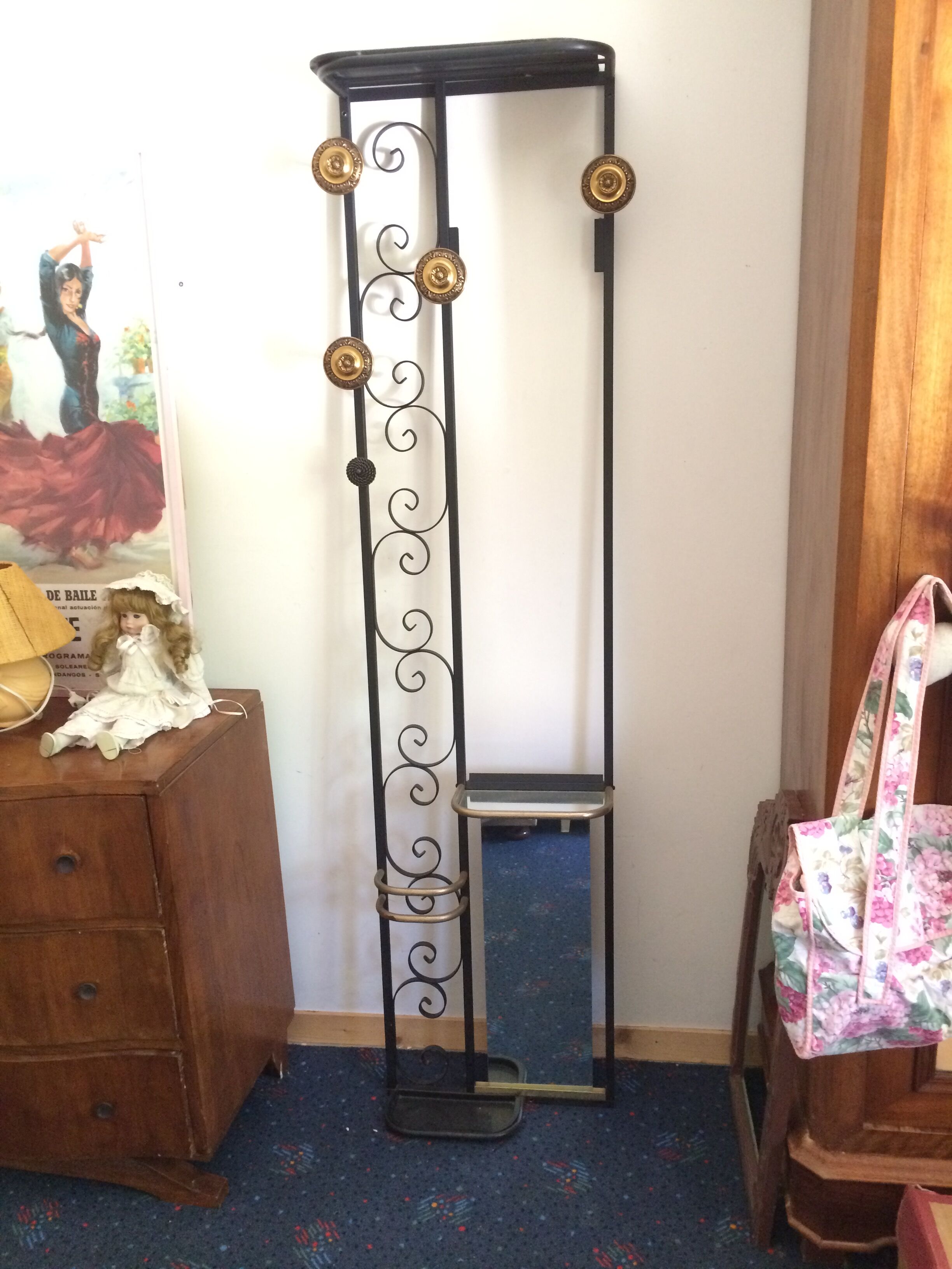 Coat hanger on wrought iron feet