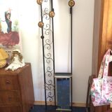 Coat hanger on wrought iron feet