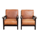 Ensemble de 2 fauteuils Art Déco en cuir de vache couleur cognac du 20e siècle.