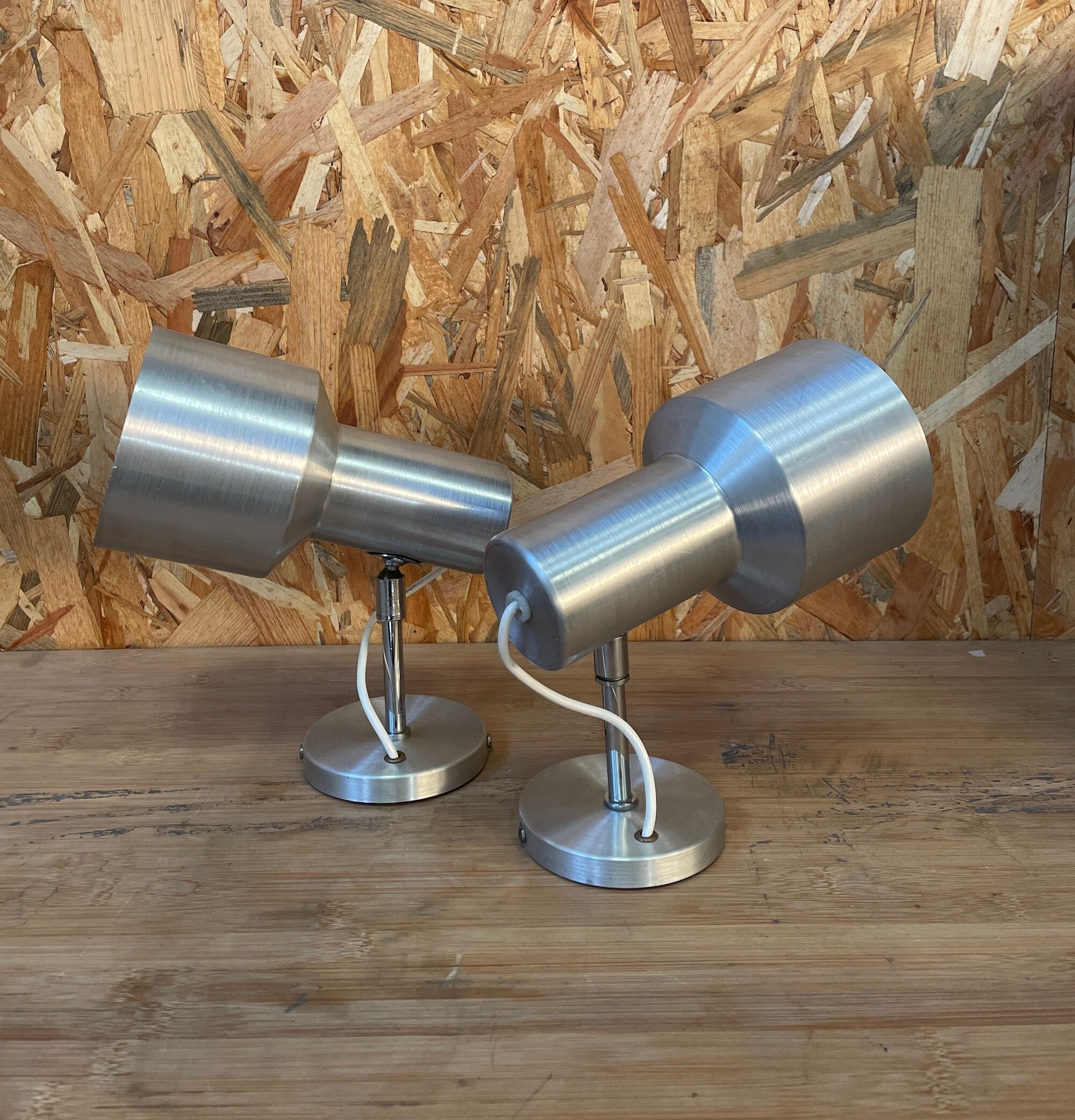 Pair of swivel brushed metal sconces