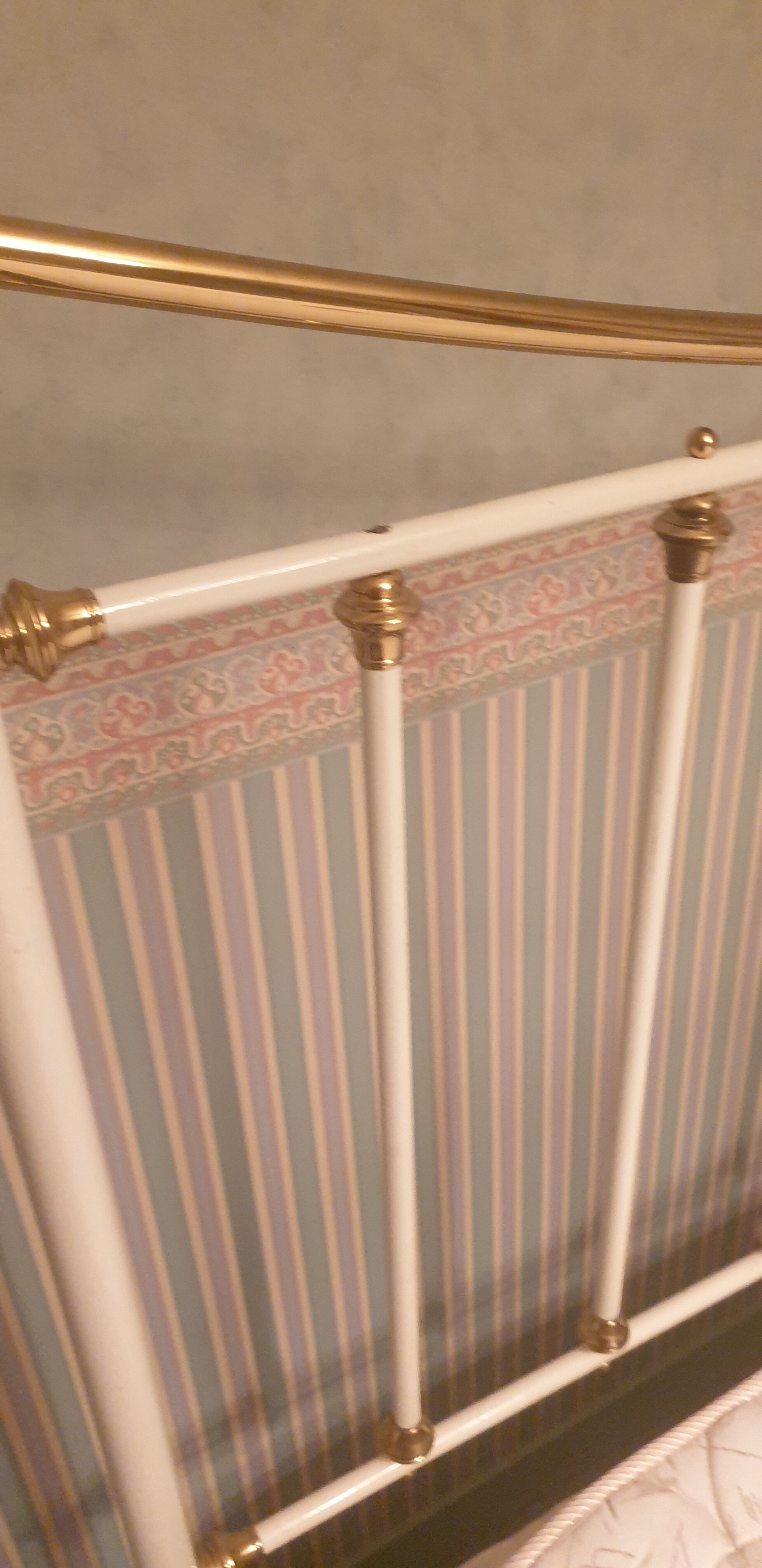 Restored old iron bed