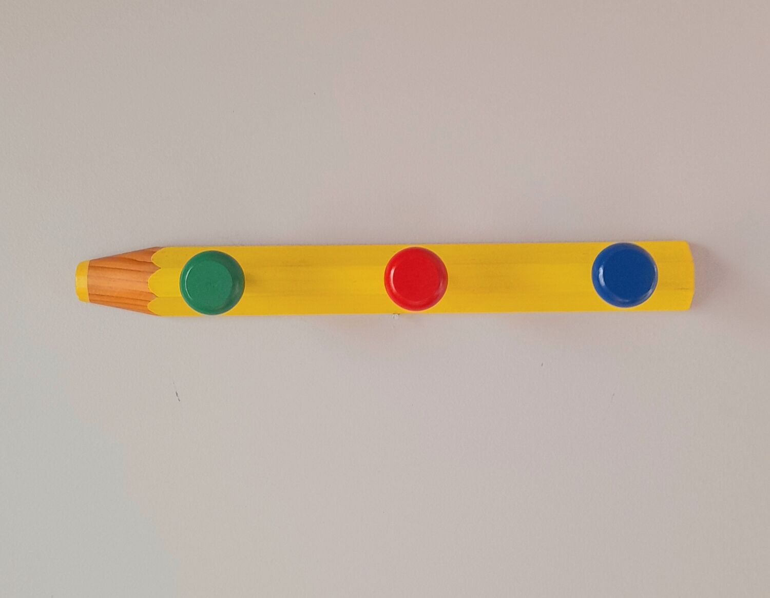Pencil wall coat rack