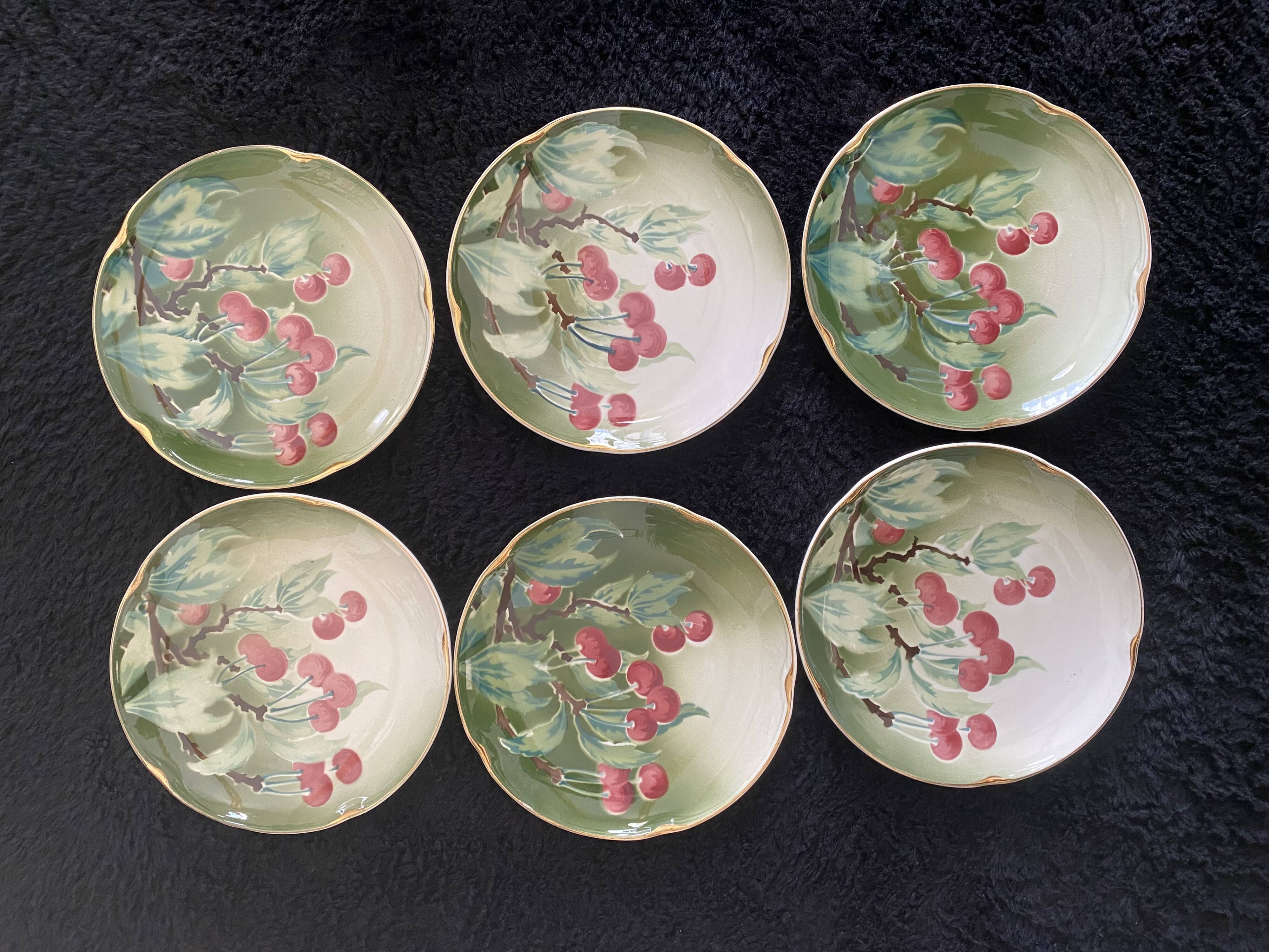 Lunéville cherry plates with golden edges