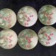 Lunéville cherry plates with golden edges