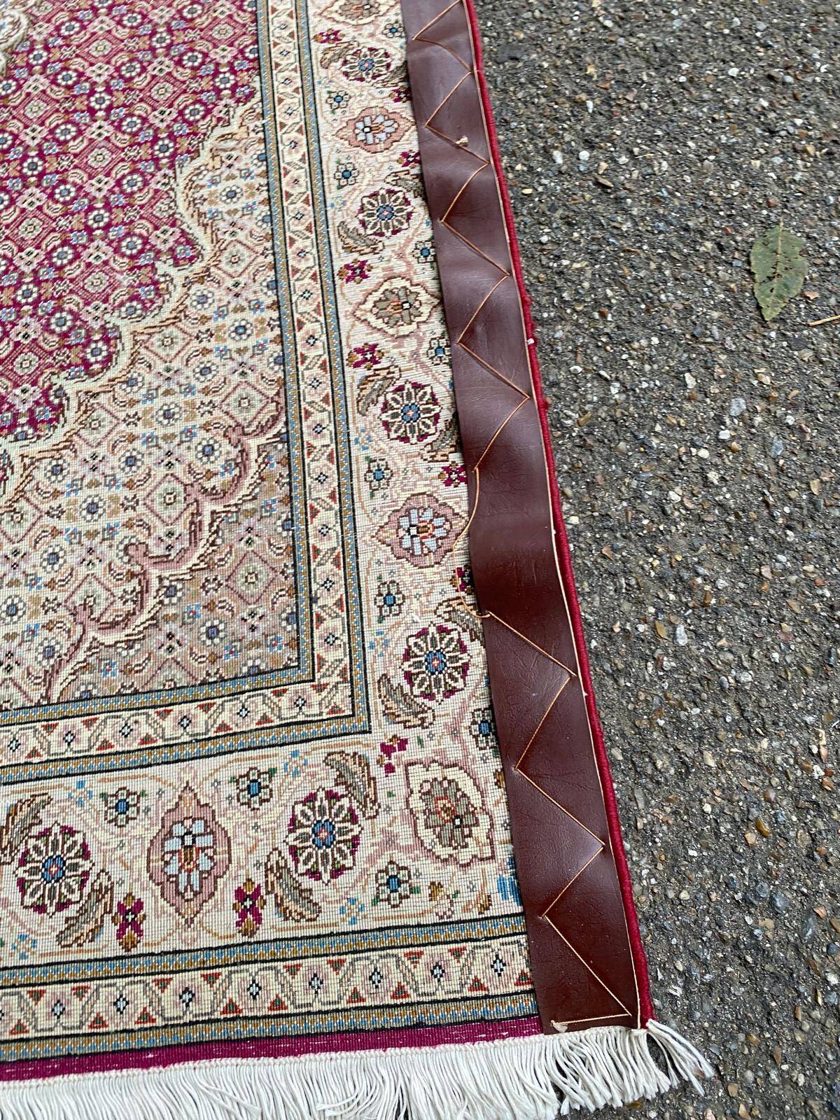 Handmade burgundy wool Persian rug 100x155cm