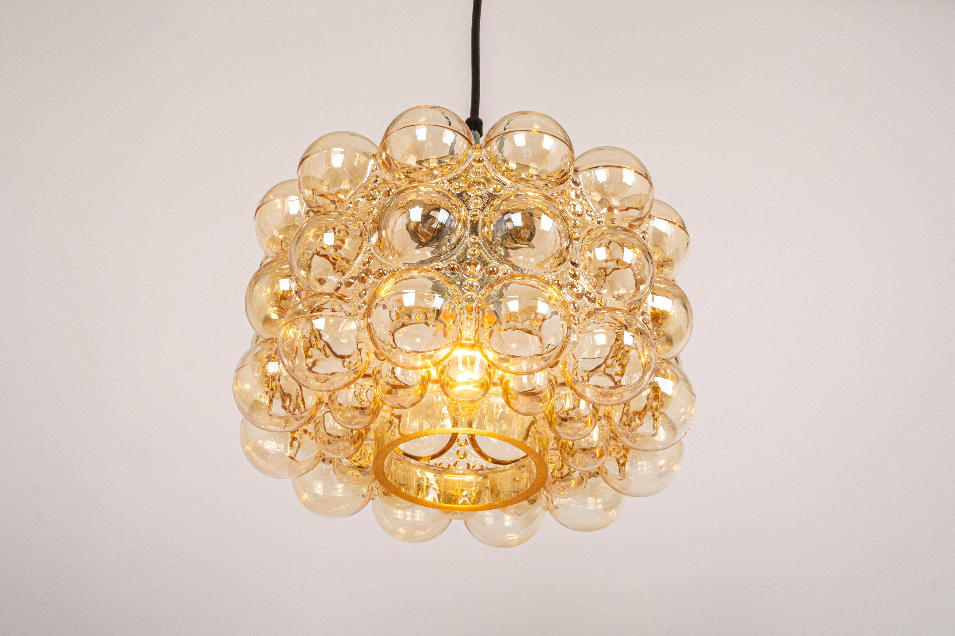 Large amber bubble glass pendant light by Helena Tynell for Limburg, Germany, 1970s.