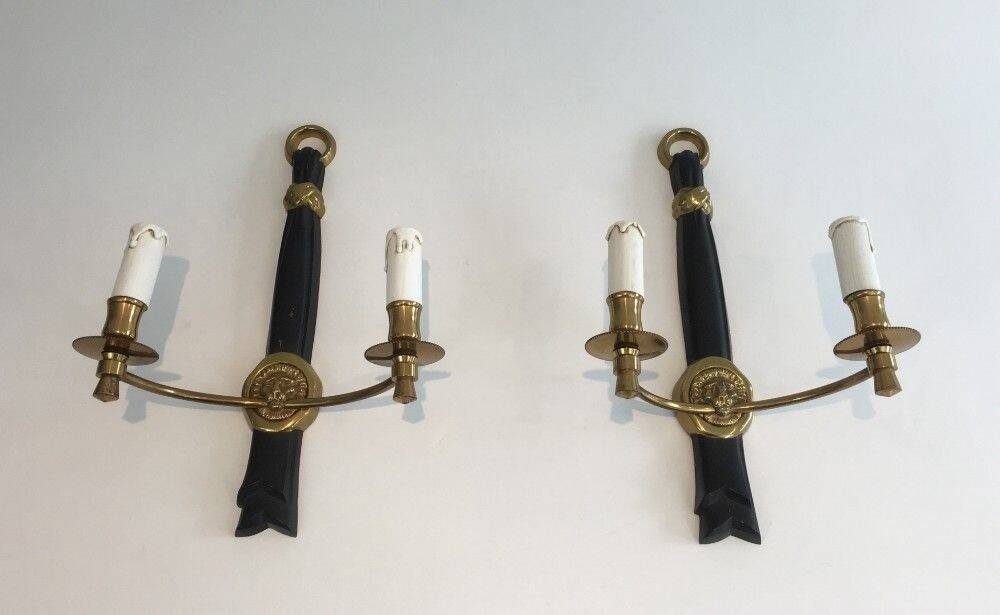 Pair of Black Lacquered Bronze Wall Lights with Lion Head Decorations