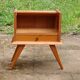 Solid pitch pine bedside table with vintage splayed legs.
