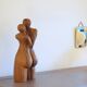 Le baiser sculpture en bois