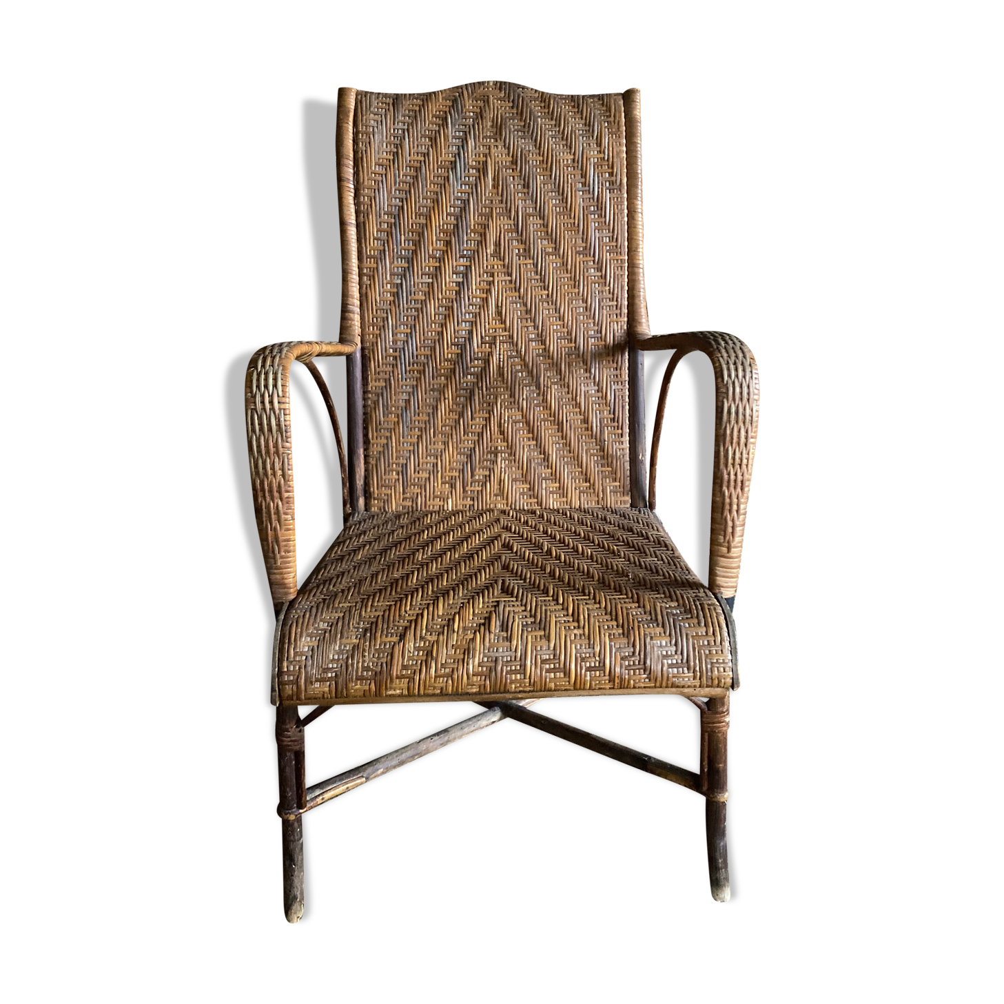 Braided rattan armchair
