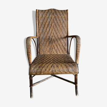 Braided rattan armchair