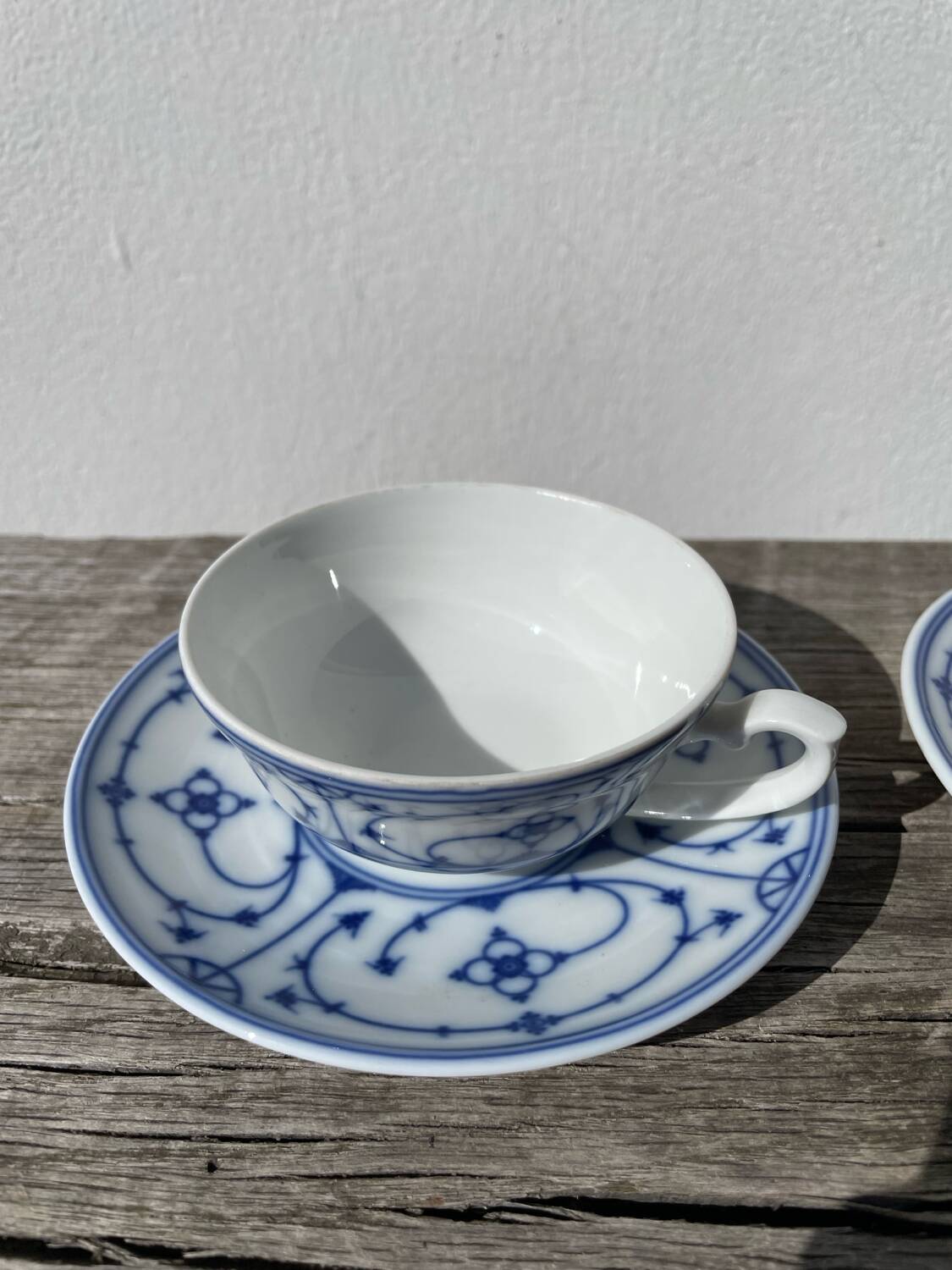 Pair of signed blue porcelain cups