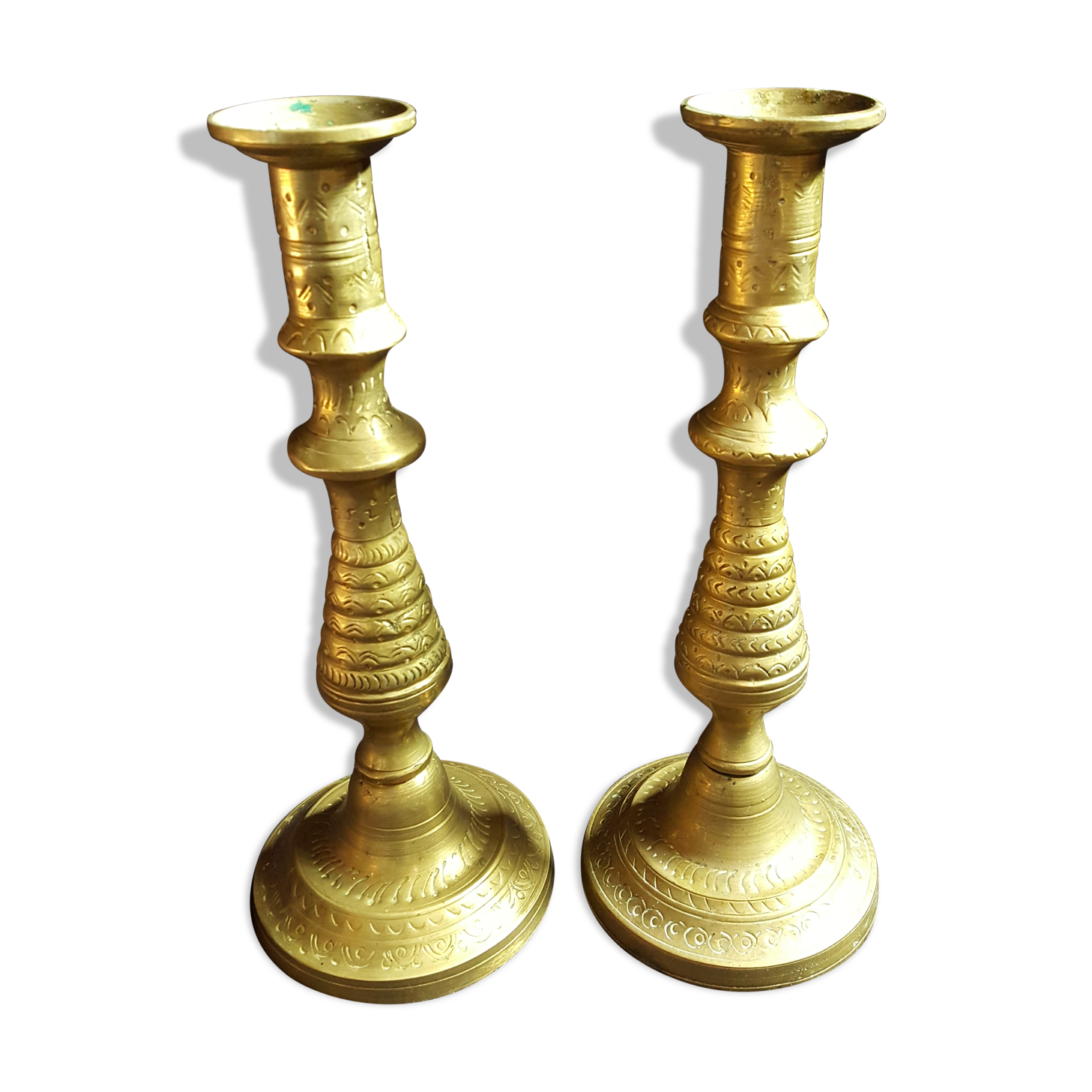 Former pair of bronze candlesticks