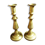 Former pair of bronze candlesticks
