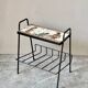 Vintage magazine table with Greek mythology design.