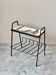 Vintage magazine table with Greek mythology design.