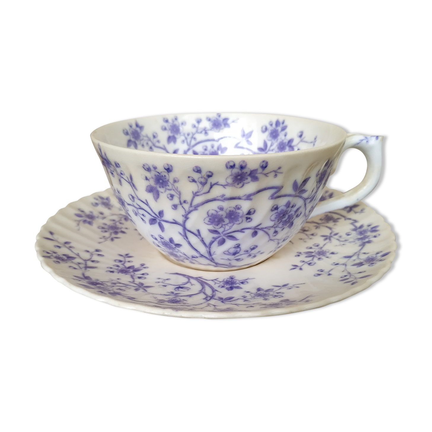 Ancient porcelain cup from eastern France with Mauve Fleurettes