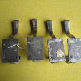 Set of four aluminum coat hooks 1950