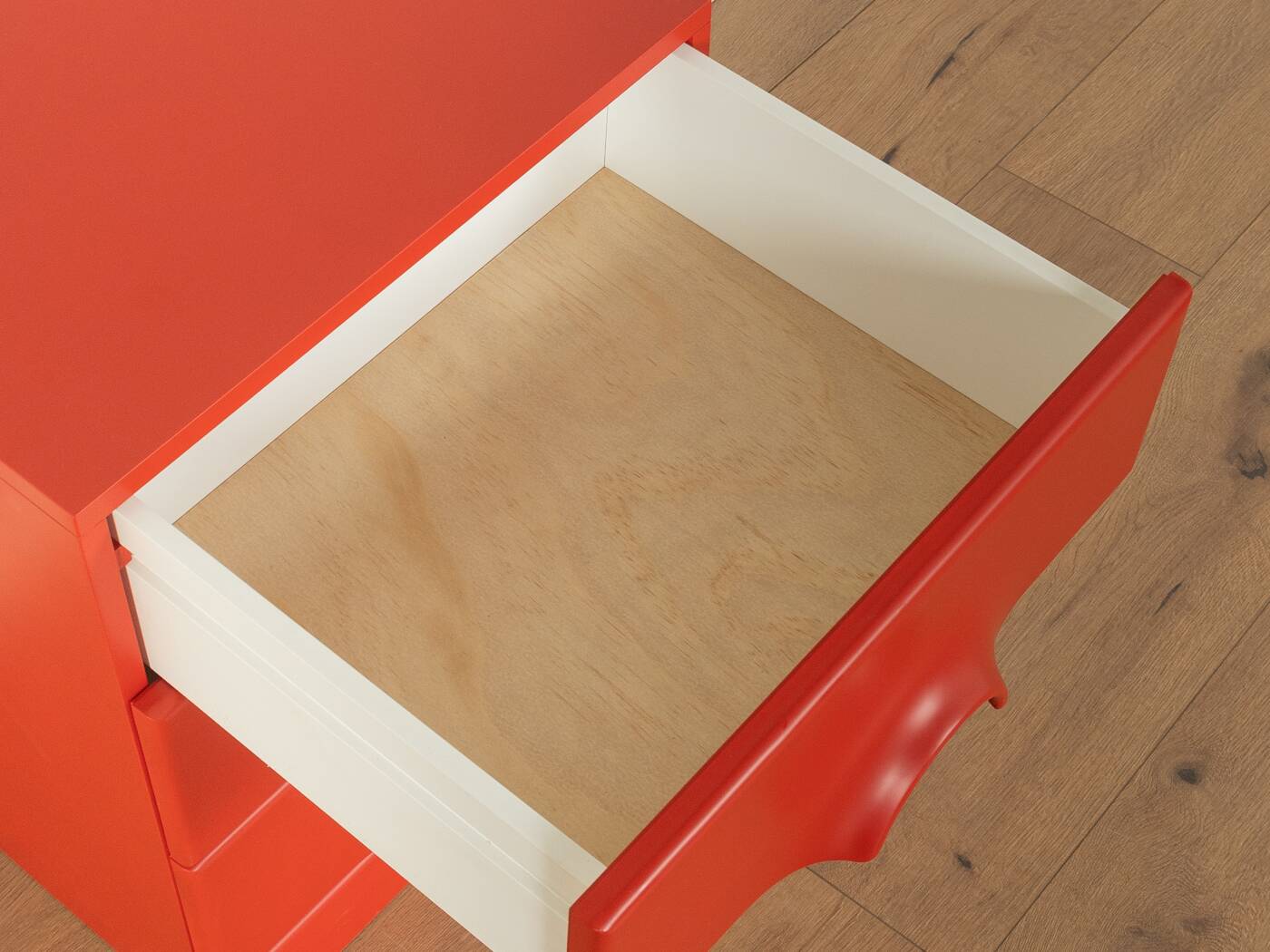 Red chest of drawers by Schönbuch in characteristic Space Age design from the 1970s