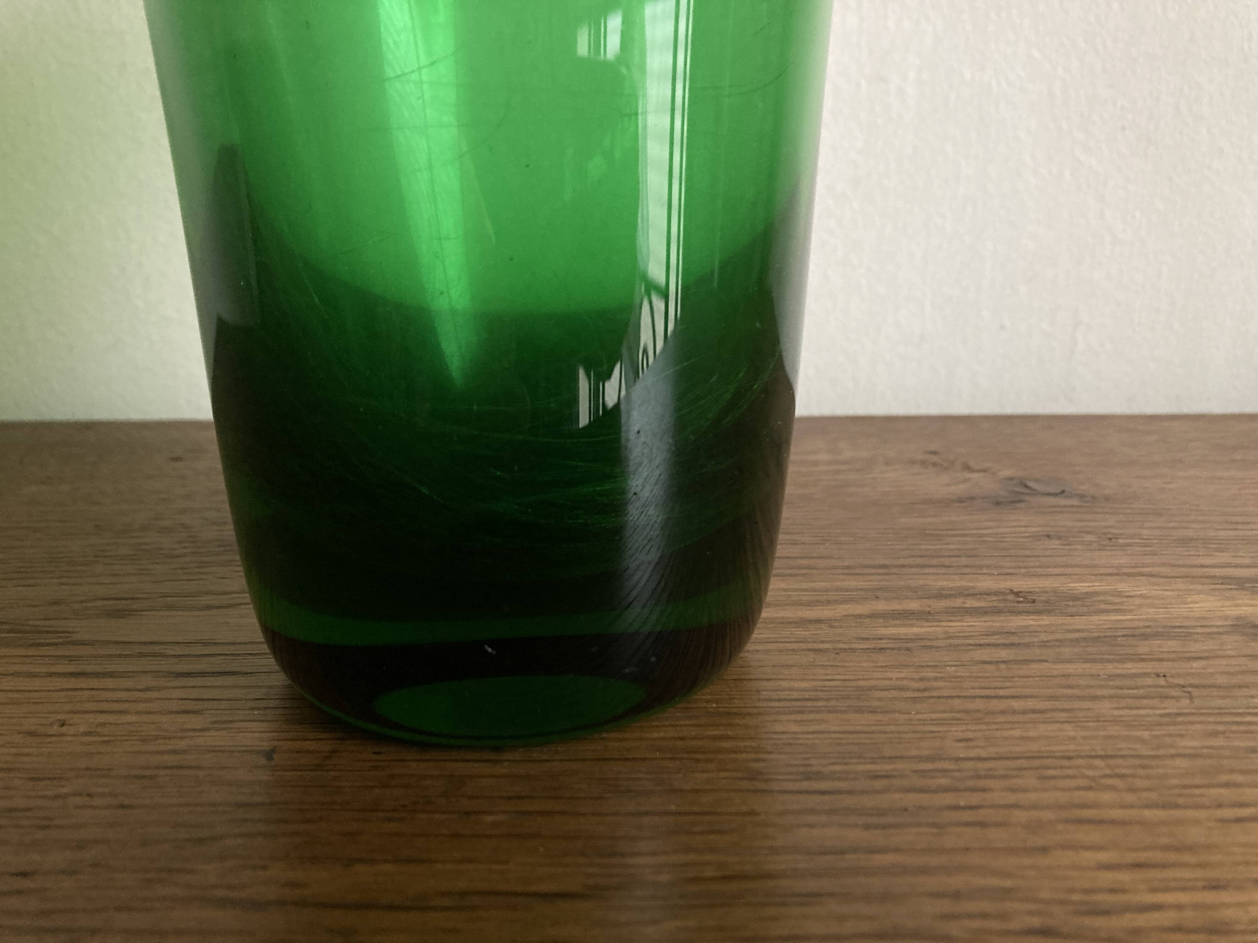 1950s Médicis vase, large Art Deco with handles, made of green blown glass.