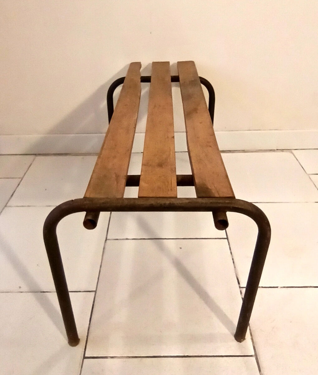 Old bench wooden slats and tubular metal base