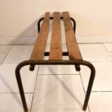 Old bench wooden slats and tubular metal base