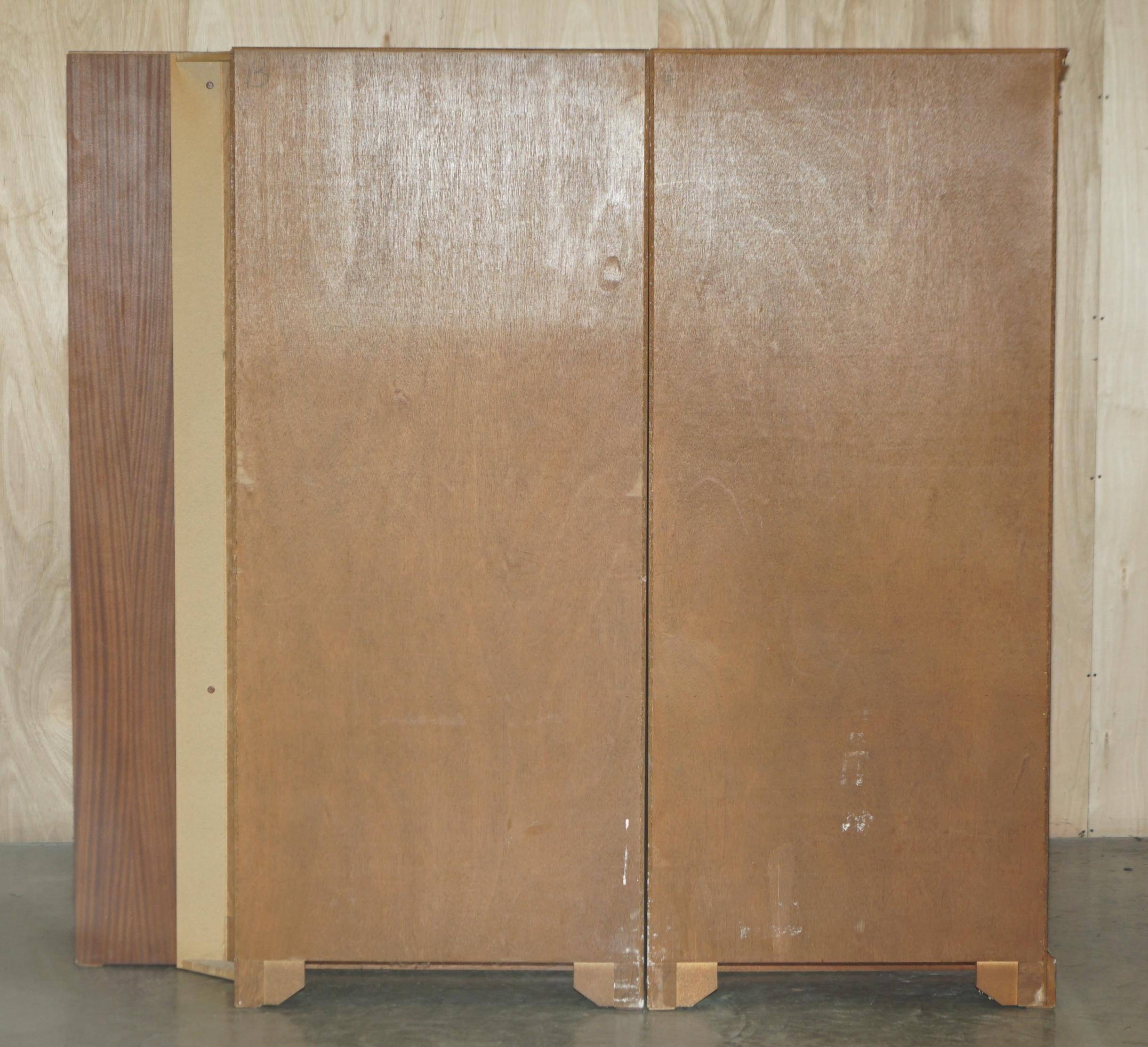 Corner library made of flamed hardwood, in 3 parts.