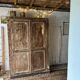 The antique patinated wardrobe