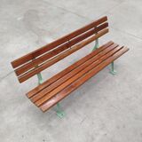 Restored and varnished garden bench in hardwood and olive green metal