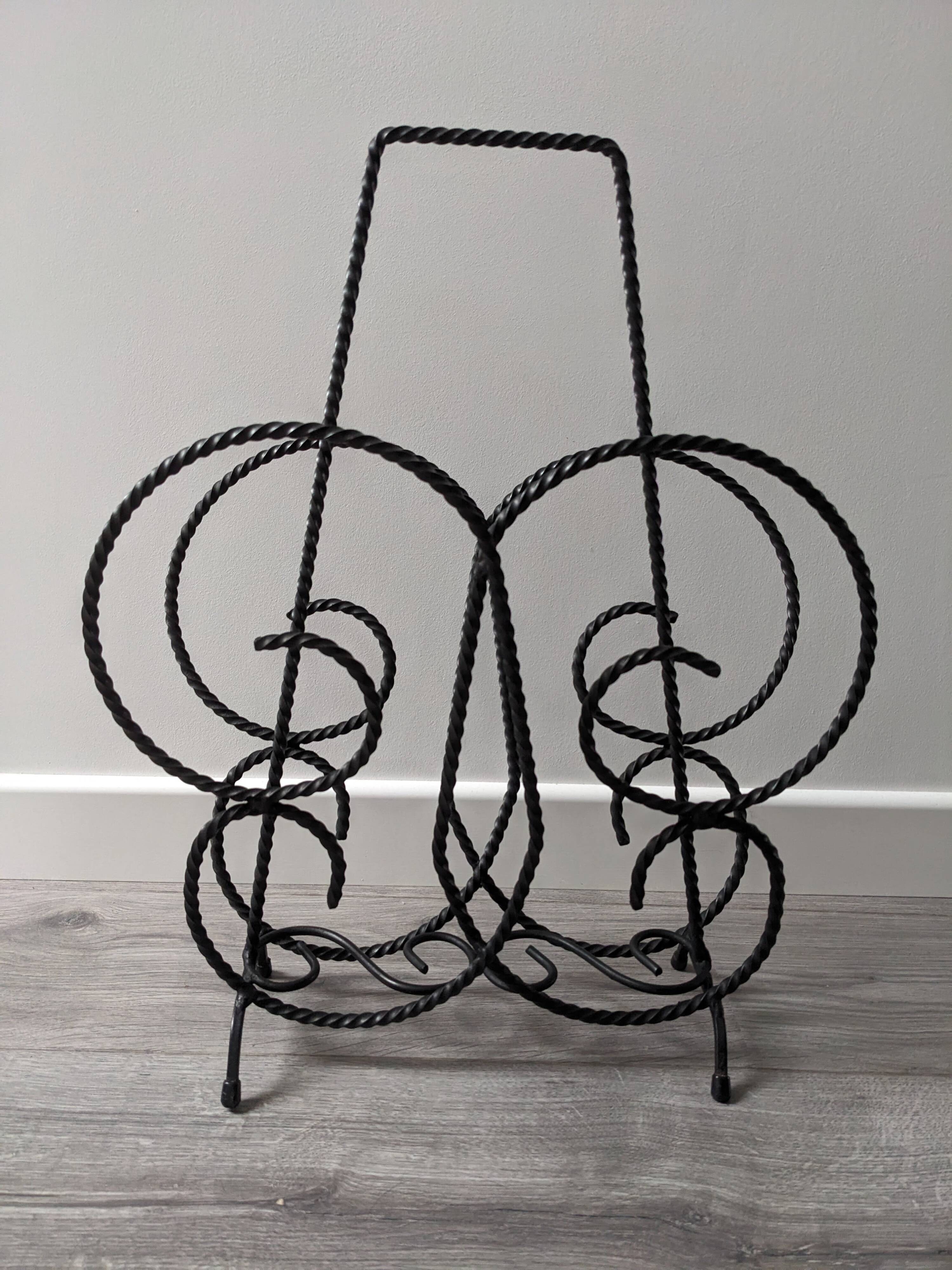 Vintage wrought iron magazine rack