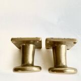 Pair of golden cast iron hooks