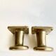 Pair of golden cast iron hooks