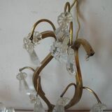 Old pair of double lamp lights with glass and brass pendants, retro decoration