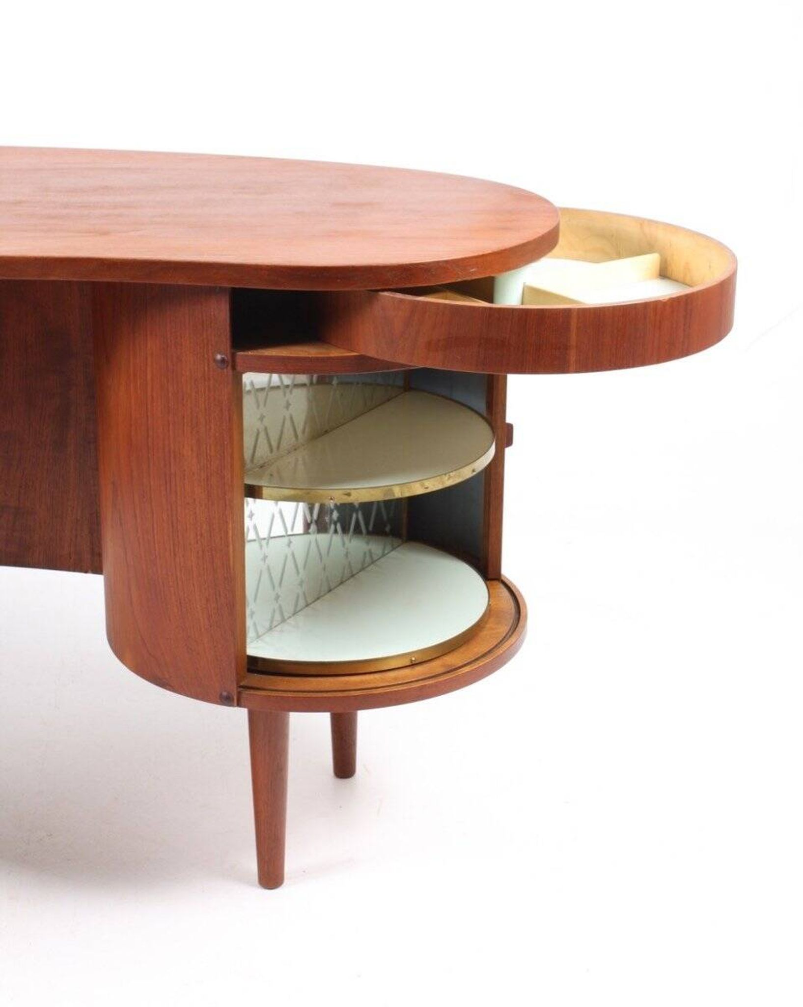 Danish teak kidney desk from the 1950s — organic shape and drum.