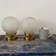 Pair of new electrified Art Deco globe sconces