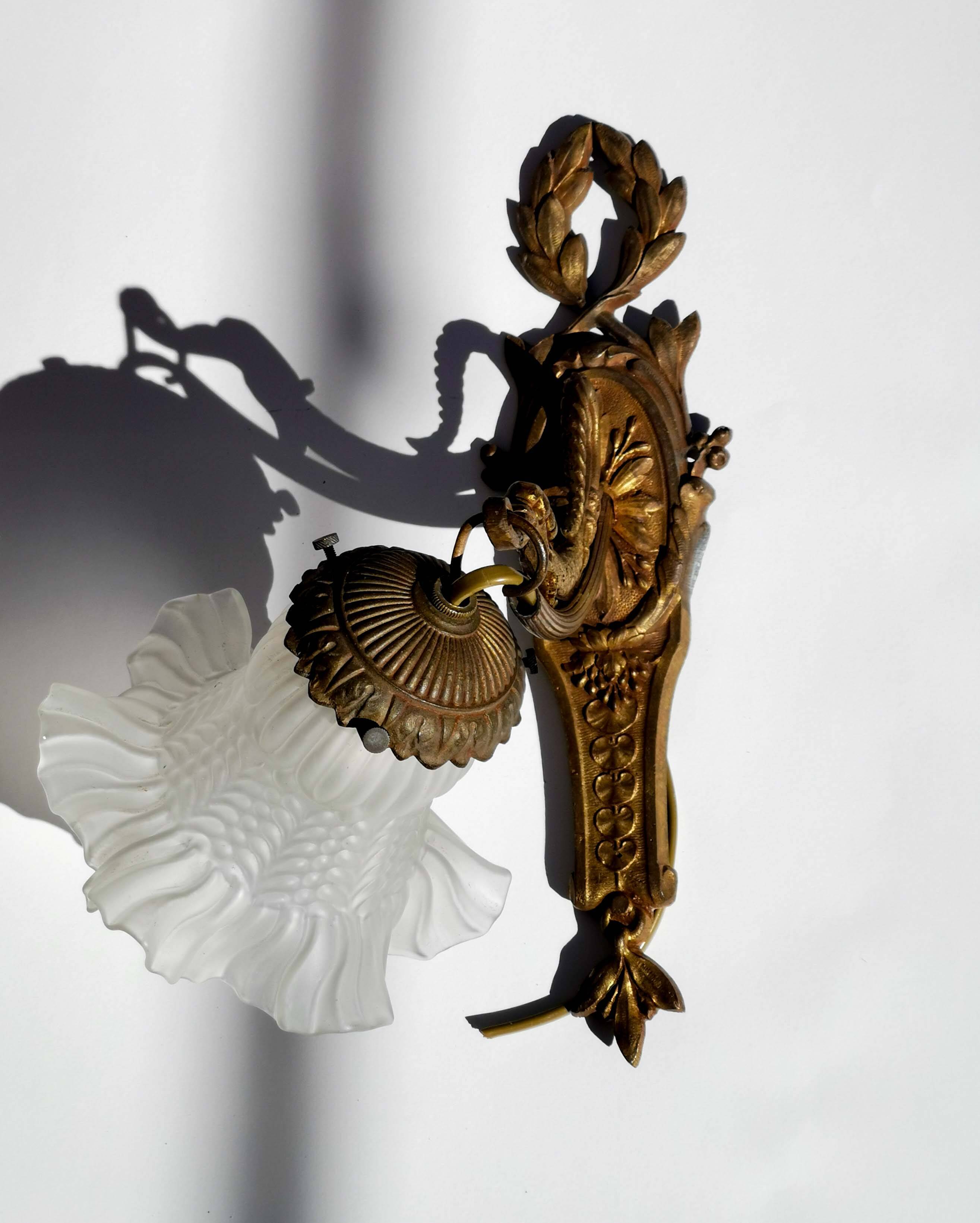 Antique bronze wall light