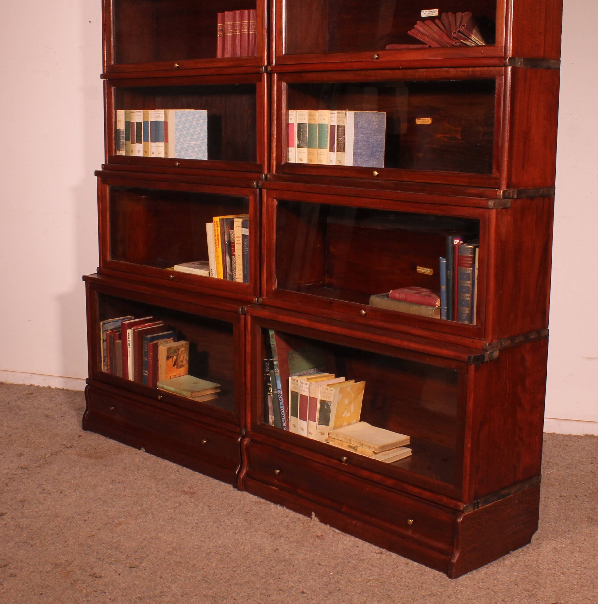 pair of Globe Wernicke London bookcases known as waterfall in mahogany circa