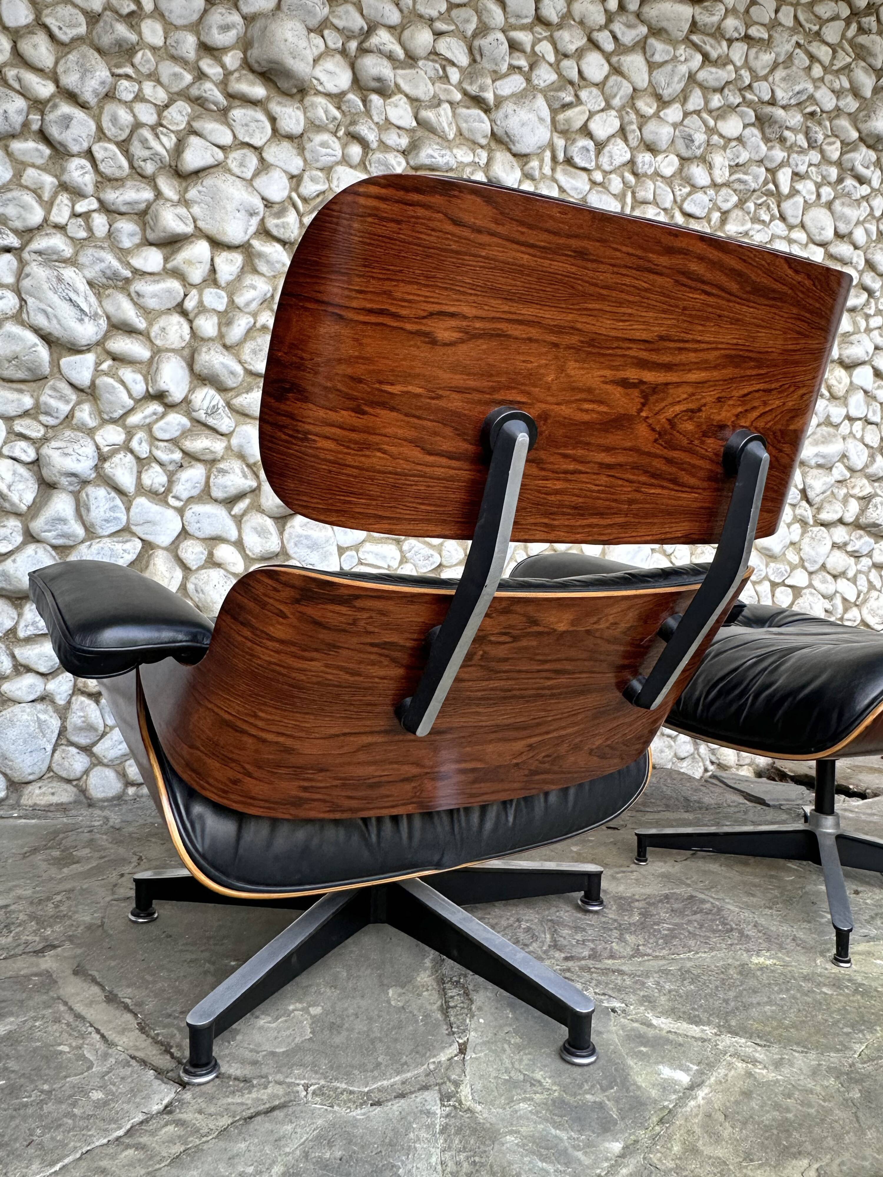 Fauteuil Lounge et ottoman Herman Miller Charles & Ray Eames, palissandre