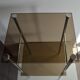 Side table in chrome and smoked glass