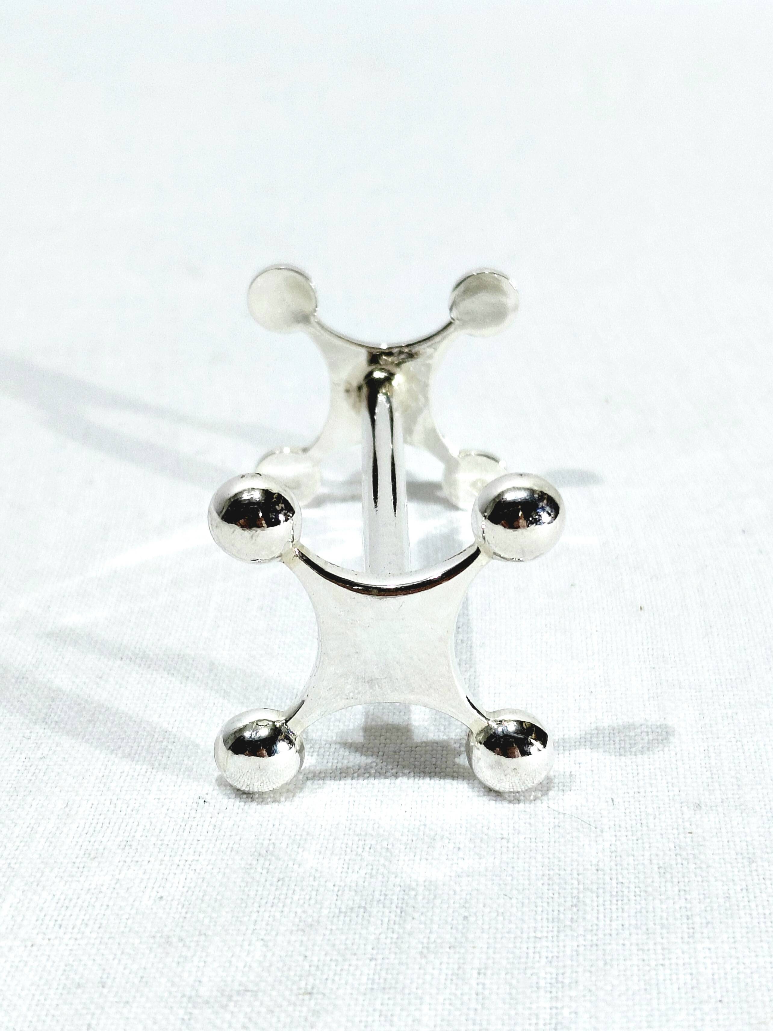 SET OF 12 SILVER-PLATED KNIFE RESTS