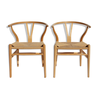 Ensemble de deux chaises Wishbone, modèle CH24, de hêtre et papercord conçu par Hans J. Wegner